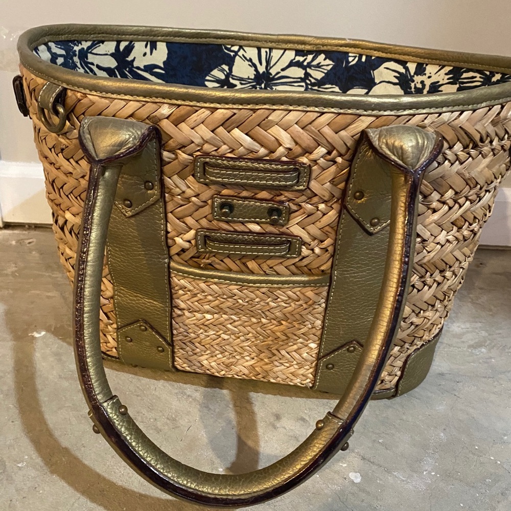 jcrew woven bag with gold straps and navy floral
